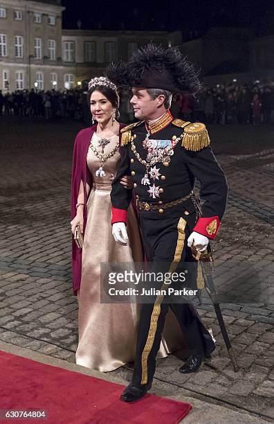 Crown Prince Frederik, and Crown Princess Mary of Denmark arrive at the Traditional New Year's Banquet hosted by Queen Margrethe of Denmark, at,...