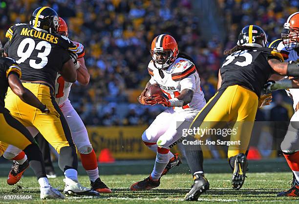 Isaiah Crowell of the Cleveland Browns rushes against the Pittsburgh Steelers in the first half during the game at Heinz Field on January 1, 2017 in...