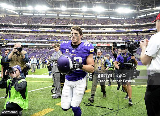 Chad Greenway of the Minnesota Vikings jogs off the field after the game on January 1, 2017 at US Bank Stadium in Minneapolis, Minnesota. The Vikings...