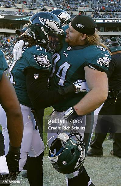 Steven Means of the Philadelphia Eagles is congratulated by teammate Beau Allen after Means blocked a punt by the Dallas Cowboys during the fourth...