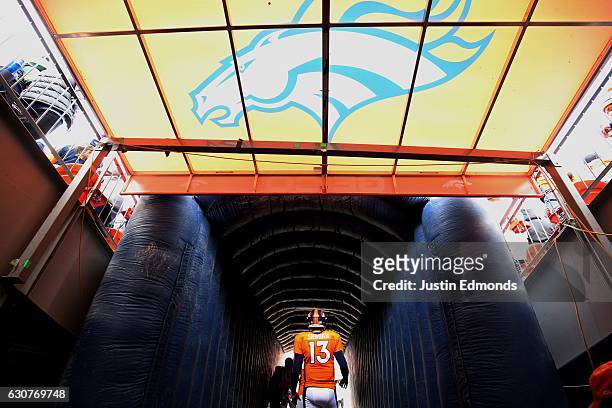 Quarterback Trevor Siemian of the Denver Broncos waits to take the field before the game against the Oakland Raiders at Sports Authority Field at...