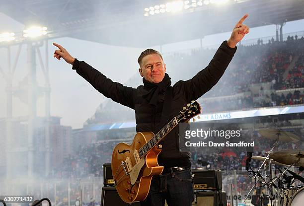 Musician Bryan Adams performs during the first intermission of the 2017 Scotiabank NHL Centennial Classic between the Detroit Red Wings and the...