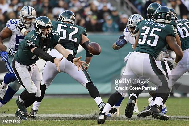 Carson Wentz of the Philadelphia Eagles pitches the ball to Terrell Watson, both of the Philadelphia Eagles, against the Dallas Cowboys during the...