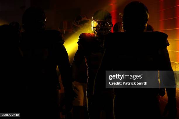 Outside linebacker Ryan Kerrigan of the Washington Redskins walks onto the field prior to a game against the New York Giants at FedExField on January...