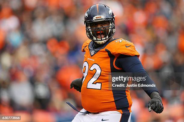 Nose tackle Sylvester Williams of the Denver Broncos celebrates in the second quarter of the game against the Oakland Raiders at Sports Authority...