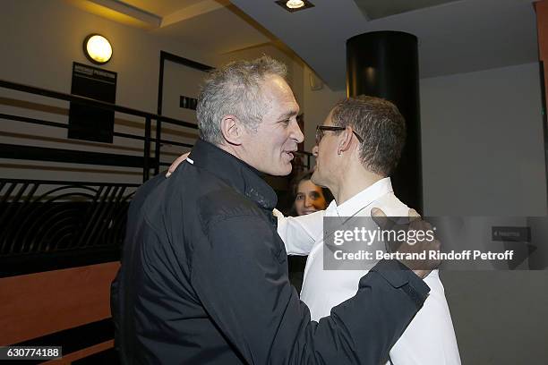 Journalist Christian Jeanpierre and Dany Boon attend "Dany Boon des Hauts de France" Show at L'Olympia on December 31, 2016 in Paris, Franc