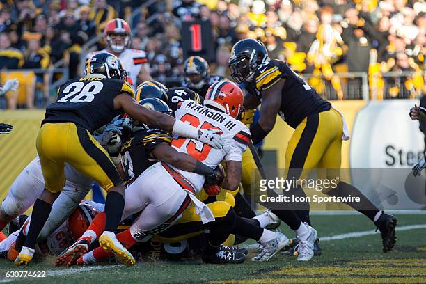 Cleveland Browns Running Back George Atkinson III leans over the goal line as he scores on a 5-yard run during the fourth quarter of the National...