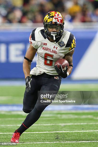Maryland Terrapins running back Ty Johnson runs with the ball during Quick Lane Bowl game action between the Boston College Eagles and the Maryland...