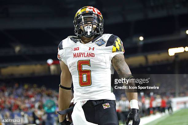 Maryland Terrapins running back Ty Johnson scores a touchdown during Quick Lane Bowl game action between the Boston College Eagles and the Maryland...