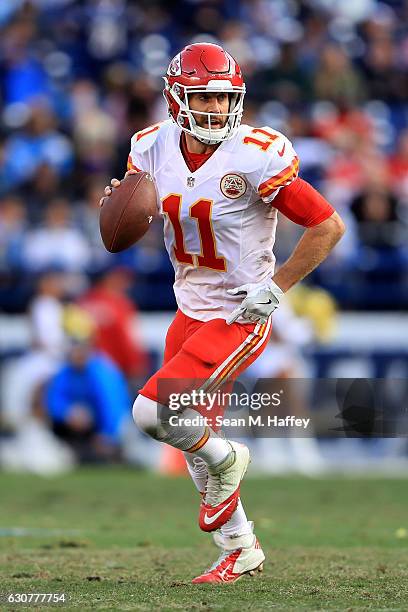 Alex Smith of the Kansas City Chiefs scrambles from the pocket during the second half of a game against the San Diego Chargers at Qualcomm Stadium on...