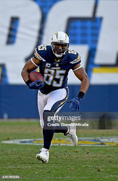 Antonio Gates of the San Diego Chargers runs for a gain late in the fourth quarter. Gates scored his 111 career touchdown in the first half, tying...