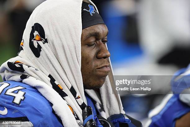 Ezekiel Ansah of the Detroit Lions watches the final seconds of the clock run down during the game against the Green Bay Packers at Ford Field on...