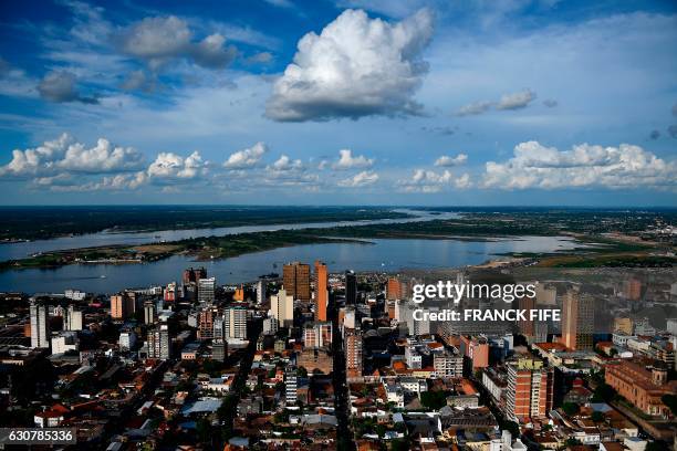 Aerial view of the 2017 Dakar Rally departure ceremony in Asuncion, Paraguay on January 1, 2017 ahead of the 2017 Dakar Rally which this year will...