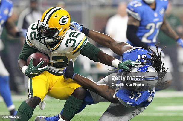 Green Bay Packers running back Christine Michael runs the ball against the Detroit Lions outside linebacker Josh Bynes during the first half of an...