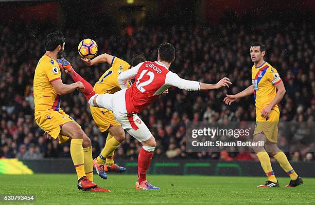 Olivier Giroud of Arsenal scores the opening goal during the Premier League match between Arsenal and Crystal Palace at Emirates Stadium on January...