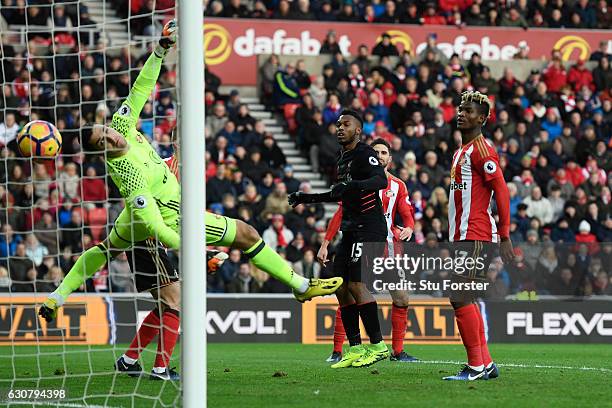 Daniel Sturridge of Liverpool scores his sides first goal past Vito Mannone of Sunderland during the Premier League match between Sunderland and...