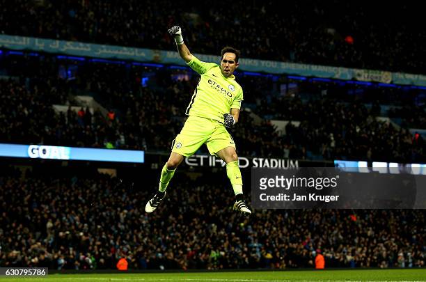 Claudio Bravo of Manchester City celebrates the goal scored by Sergio Aguero of Manchester City during the Premier League match between Manchester...