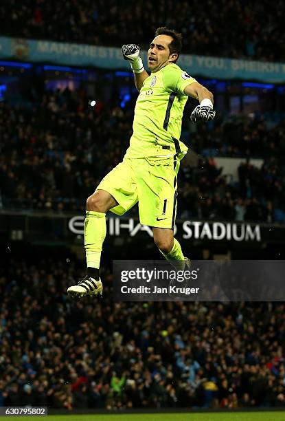 Claudio Bravo of Manchester City celebrates the goal scored by Sergio Aguero of Manchester City during the Premier League match between Manchester...