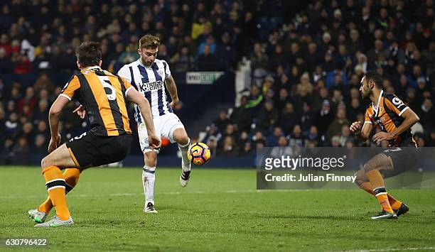 James Morrison of West Bromwich Albion scores his sides third goal during the Premier League match between West Bromwich Albion and Hull City at The...