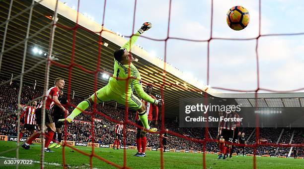 Sunderland goalkeeper Vito Mannone is beaten by a header from Liverpool player Daniel Sturridge for the opening Liverpool goal during the Premier...