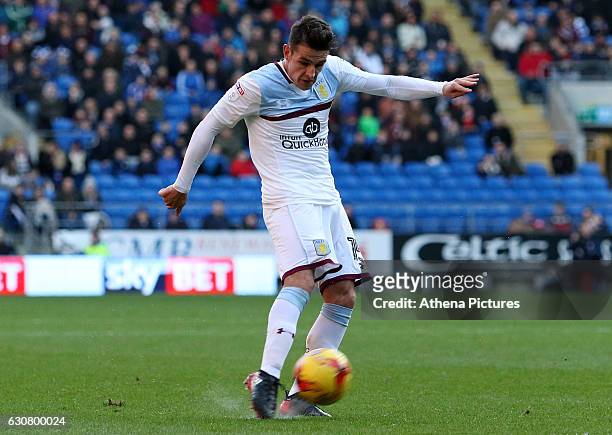 Ashley Westwood of Aston Villa has a shot on goal during the Sky Bet Championship match between Cardiff City and Aston Villa at The Cardiff City...