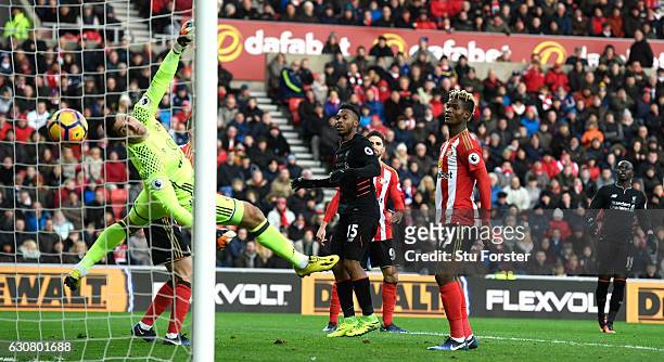 Daniel Sturridge of Liverpool scores his sides first goal past Vito Mannone of Sunderland during the Premier League match between Sunderland and...