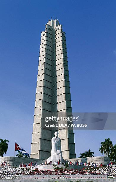 May Day rally in Revolution square, with the Jose Julian Marti Perez memorial monument and tower, Havana, Cuba.