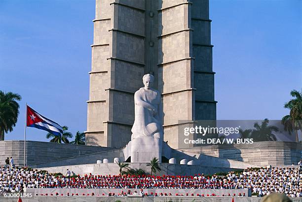 May Day rally in Revolution square, with the Jose Julian Marti Perez memorial monument and tower, Havana, Cuba.