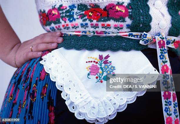 Embroidered traditional costume, Holloko, Hungary.