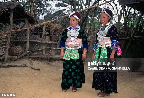 Hmong women in traditional dress, Plain of Jars, Laos.