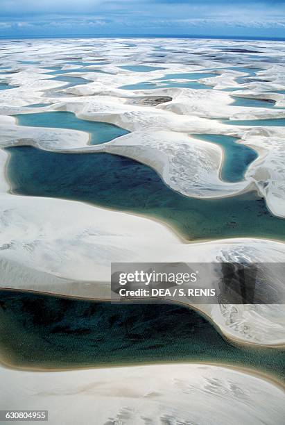 Sand dunes known as white sheets and freshwater lakes, Lencois Maranhenses national park, Maranhao state, Brazil.