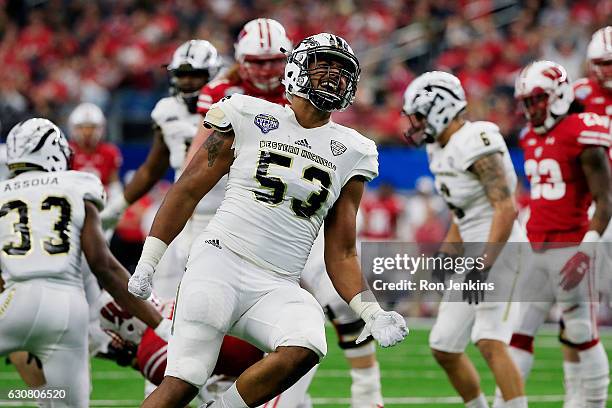 Nathan Braster of the Western Michigan Broncos celebrates a sack in the third quarter during the 81st Goodyear Cotton Bowl Classic between Western...