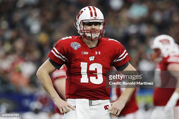 Bart Houston of the Wisconsin Badgers looks on in the third quarter during the 81st Goodyear Cotton Bowl Classic between Western Michigan and...