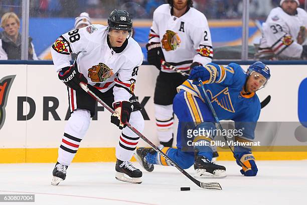 Patrick Kane of the Chicago Blackhawks handles the puck against the St. Louis Blues during the 2017 Bridgestone NHL Winter Classic at Busch Stadium...