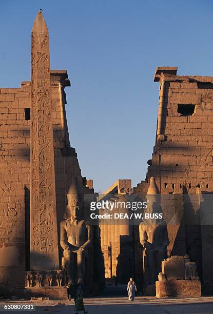 First Pylon and obelisk of the Temple of Amun, Theban Necropolis , Luxor, Egypt. Egyptian civilisation, New Kingdom, Dynasty XIX.