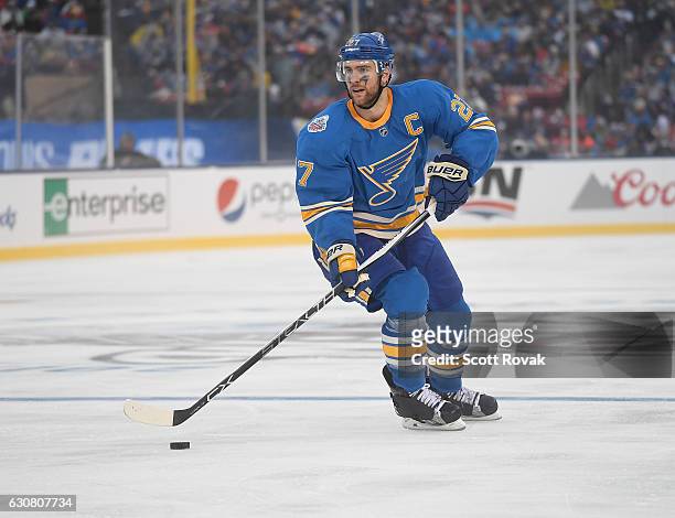 Alex Pietrangelo of the St. Louis Blues skates with the puck against the Chicago Blackhawks during the 2017 Bridgestone NHL Winter Classic at Busch...
