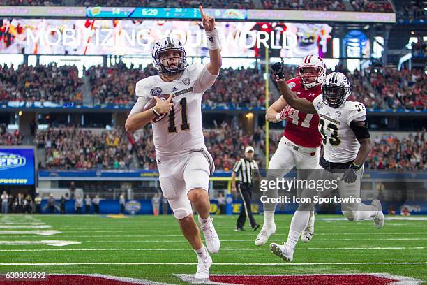 Western Michigan Broncos quarterback Zach Terrell scores during the NCAA Bowl Game Series Goodyear Cotton Bowl matchup between the Western Michigan...