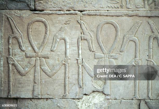 Symbolic frieze with the Ankh and Was sceptres, Temple of Sobek and Haroeris, Kom Ombo, Egypt. Roman period.