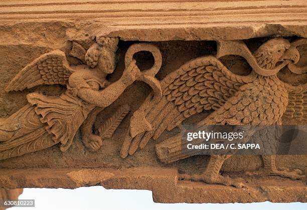 Angel and bird of prey, bas-relief on a door in Hatra , Hatra, Iraq. Seleucid civilisation.