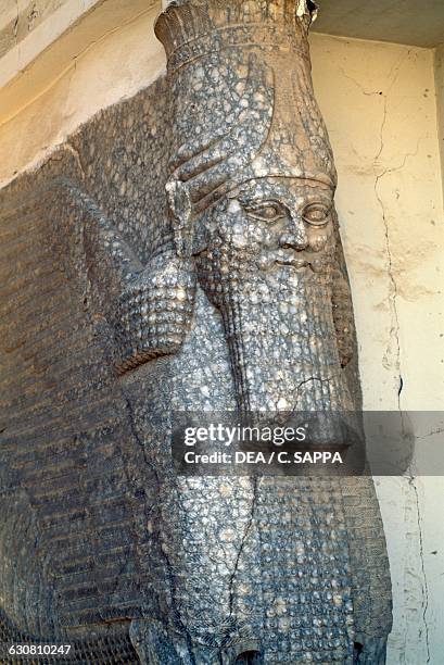 Statue next to the Nergal door, Nineveh, site was partially destroyed in 2015, Iraq. Assyrian civilisation, 8th-7th century BC.