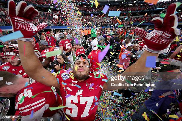 Alec James of the Wisconsin Badgers celebrates after the Wisconsin Badgers beat the Western Michigan Broncos 24-16 in the 81st Goodyear Cotton Bowl...