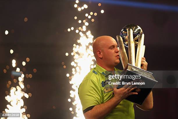 Michael van Gerwen of The Netherlands celebrates winning the final of the 2017 William Hill PDC World Darts Championships at Alexandra Palace on...