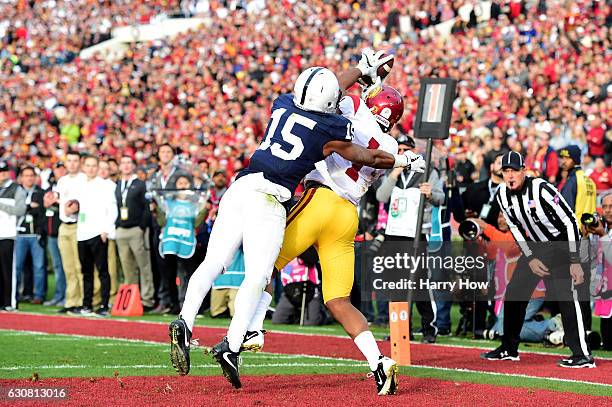 Wide receiver Darreus Rogers of the USC Trojans makes a 3-yard touchdown reception against cornerback Grant Haley of the Penn State Nittany Lions in...