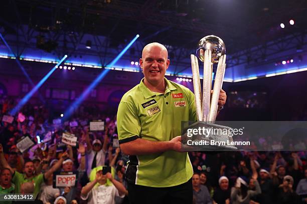 Michael van Gerwen of The Netherlands celebrates winning the final of the 2017 William Hill PDC World Darts Championships at Alexandra Palace on...