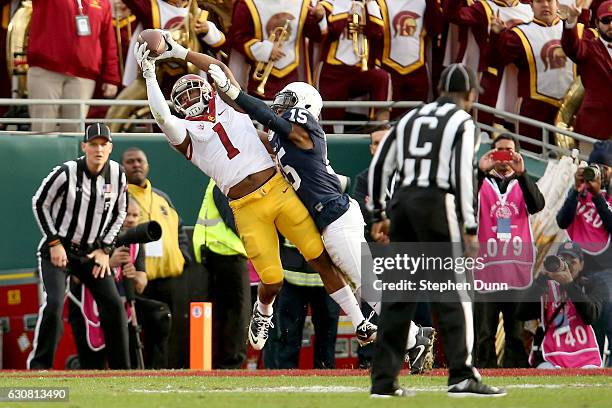 Wide receiver Darreus Rogers of the USC Trojans makes a 3-yard touchdown reception against cornerback Grant Haley of the Penn State Nittany Lions in...