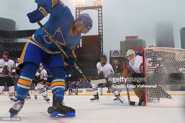 Niklas Hjalmarsson and Corey Crawford of the Chicago Blackhawks defend the goal against Robby Fabbri of the St. Louis Blues during the 2017...