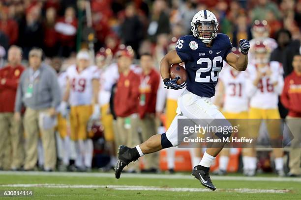Running back Saquon Barkley of the Penn State Nittany Lions rushes for a 79-yard touchdown in the third quarter against the USC Trojans during the...