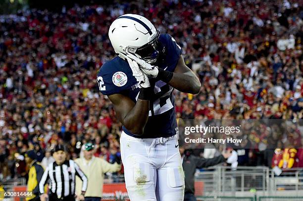 Wide receiver Chris Godwin of the Penn State Nittany Lions reacts after scoring a 72-yard touchdown in the third quarter against the USC Trojans...