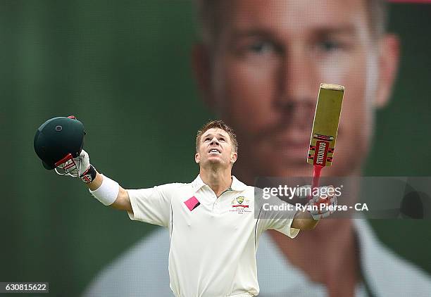 David Warner of Australia celebrates after reaching his century during day one of the Third Test match between Australia and Pakistan at Sydney...