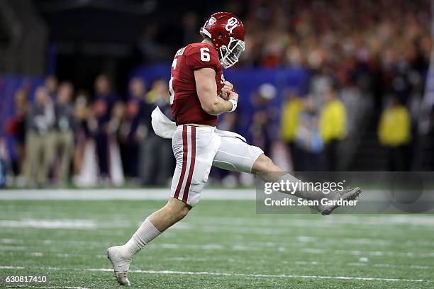 Baker Mayfield of the Oklahoma Sooners reacts after a touchdown against the Auburn Tigers during the Allstate Sugar Bowl at the Mercedes-Benz...